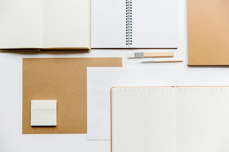 Digital product listing mockup showing a printable planner on a desk with coffee
